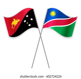 Papuan and Namibian crossed flags. Papua New Guinea combined with Namibia isolated on white. Language learning, international business or travel concept.