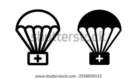 Parachute with first aid kit Icon set in black filled and line.
