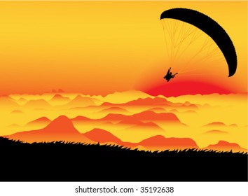 Paragliding at sunset.