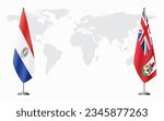 Paraguay and Bermuda flags for official meeting against background of world map.