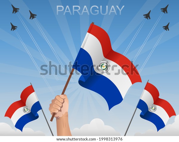 Paraguay flags\
fluttering under the blue\
sky