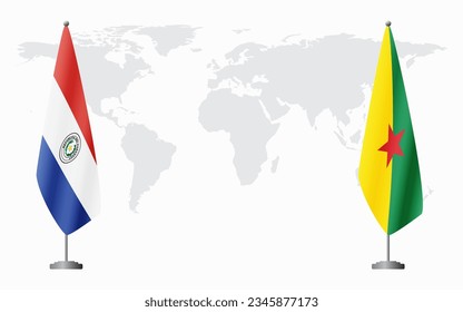 Paraguay and French Guiana flags for official meeting against background of world map.