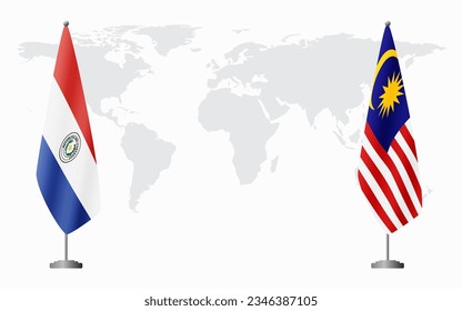 Paraguay and Malaysia flags for official meeting against background of world map.