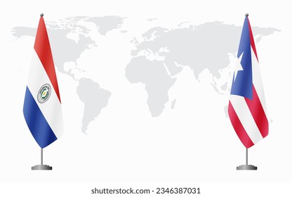 Paraguay and Puerto Rico flags for official meeting against background of world map.