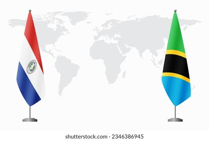 Paraguay and Tanzania flags for official meeting against background of world map.