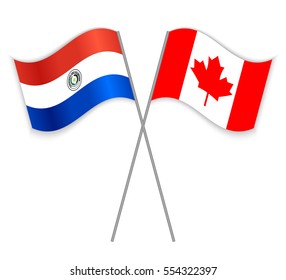 Paraguayan and Canadian crossed flags. Paraguay combined with Canada isolated on white. Language learning, international business or travel concept.