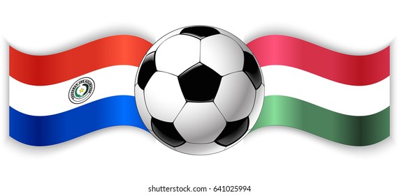 Paraguayan and Hungarian wavy flags with football ball. Paraguay combined with Hungary isolated on white. Football match or international sport competition concept.