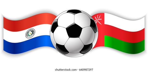 Paraguayan and Omani wavy flags with football ball. Paraguay combined with Oman isolated on white. Football match or international sport competition concept.