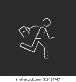 Paramedic running with first aid kit hand drawn in chalk on a blackboard vector white icon isolated on a black background.