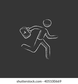 Paramedic running with first aid kit. Drawn in chalk icon.