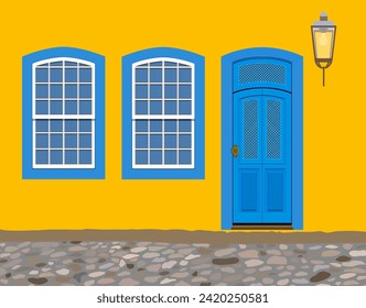 Paraty, Brazil. Facade of yellow house with blue doors and windows from the colonial period and cobblestone street in the historic center. Realistic vector illustration.