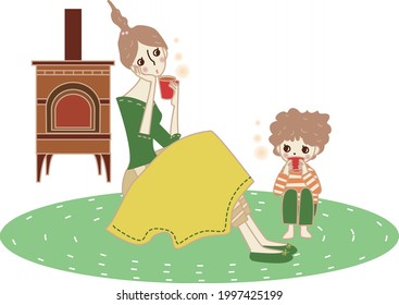 Padres y niños tomando té en la habitación.