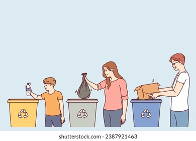 Parents and children stand near trash cans, participating in separate waste collection for helping to take care of environment. Boy and mom and dad are engaged in separate waste collection