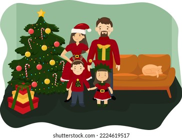 Parents with daughter and son at home in front of the christmas tree with presents