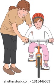 
Eltern, die ihren Kindern beim Fahrradfahren helfen