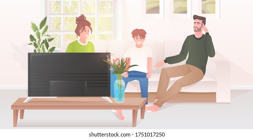 parents with little son watching tv show family sitting on couch spending time together modern living room interior horizontal full length vector illustration