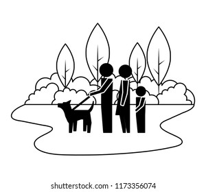 parents with son and dog mascot in landscape