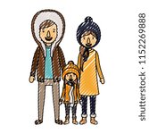 parents and son with winter clothes