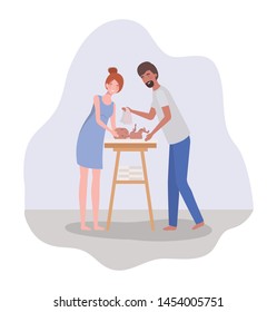 parents taking care of newborn baby with diaper changer