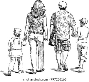 Parents with their kids go for a stroll