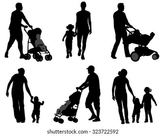 parents walking with their children silhouettes