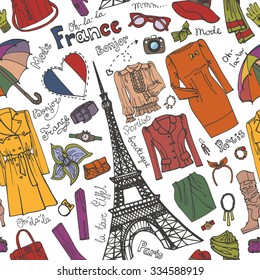 Paris Fashion seamless pattern.Clothing and accessories ,Eiffel tower.Hand drawing doodle set.Autumn,winter,spring fashion wear.Vector Illustration,sketch style.France,Europe travel background