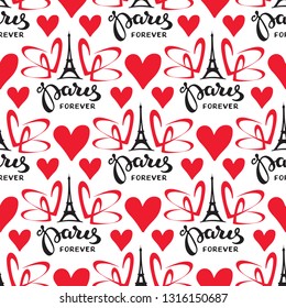 Paris hand drawn lettering with Eiffel Tower silhouette. Seamless pattern. Design element for fabric, wallpaper or wrapping paper. Romantic illustration.