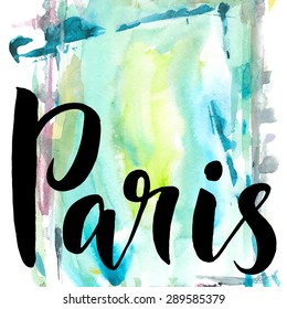 Paris, ink hand lettering. Abstract watercolor background.