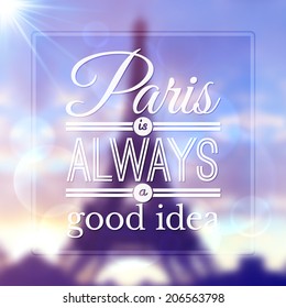 Paris typographic design on blurred Eiffel tower background