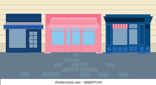 Parisian stores. Laconic, beautiful wooden facades in pink and blue colors. large Windows. The European showcase of the store.