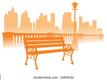 Park bench on the city background