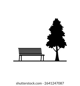 Park bench silhouette underneath a tree