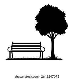 Park bench underneath a shady tree silhouette.
