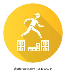 Parkour yellow flat design long shadow glyph icon. Traceur running in city environment. Traversing obstacles. Person jumping in urban space. Street workout. Vector silhouette illustration