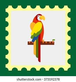 Parrot sitting on tree branch