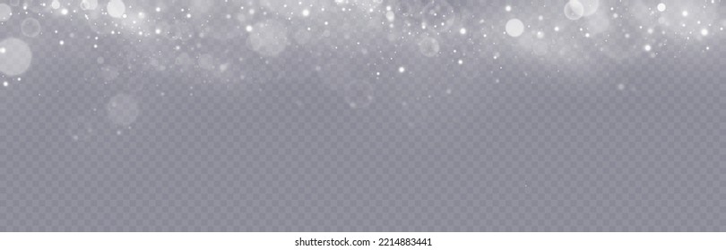 Particles of white magic dust. Shining light particles.Christmas glitter particles. Light effect on a transparent background.