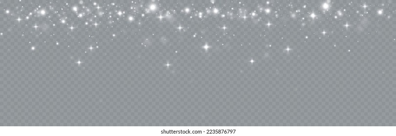 Particles of white magic dust. Shining light particles.Christmas glitter particles. Light effect on a transparent background