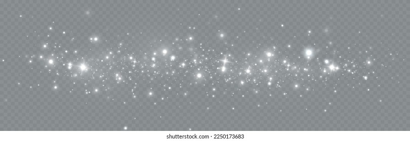 Particles of white magic dust. Shining light particles.Christmas glitter particles. Light effect on a transparent background