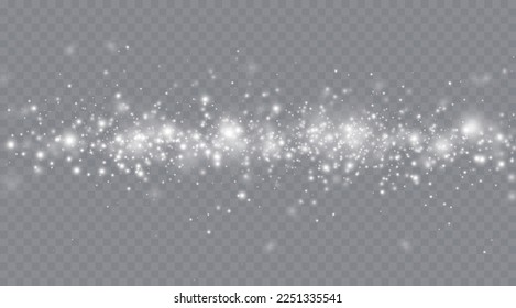 Particles of white magic dust. Shining light particles.Christmas glitter particles. Light effect on a transparent background