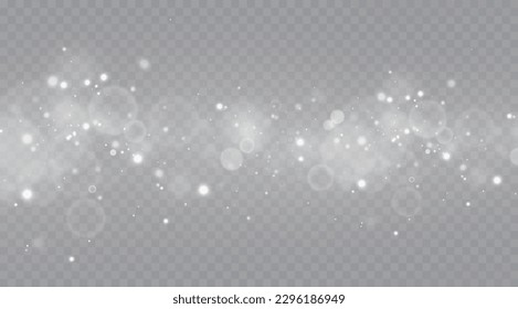 Particles of white magic dust. Shining light particles.Christmas glitter particles. Light effect on a transparent background