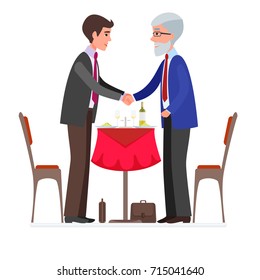 Partners businessmen shaking hands before business lunch

