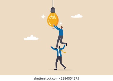 Partnership to success together, teamwork help get solution to solve problem, support to togetherness, collaboration and cooperation concept, businessman help support coworker to turn on lightbulb.