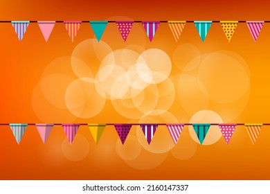 Party background with flags and white bokeh balls on orange background