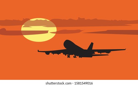Passenger airplane. Landscape with black airplane is flying in the orange sky with clouds over sunset.Commercial plane.
