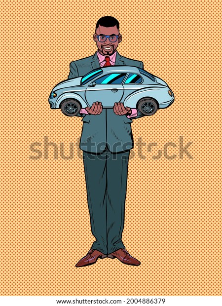Passenger car in the hands of\
the seller. A black male businessman. Rental and sale of motor\
vehicles