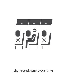 Passenger inside plane black glyph icon. Safe travel. Pictogram for web, mobile app, promo.