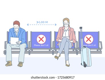 Passenger wearing face mask and waiting for flight at airport. Themes traveling during pandemic and personal protection. The airport with social distancing concept. New normal concept.