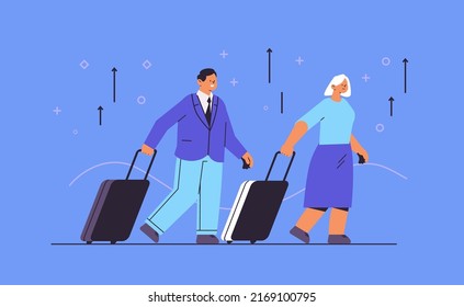 passengers couple with baggage man woman walking with luggage traveling concept horizontal