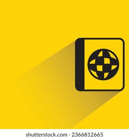 passport with shadow on yellow background