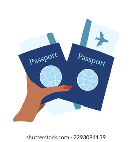 passports and air tickets in a womans hand